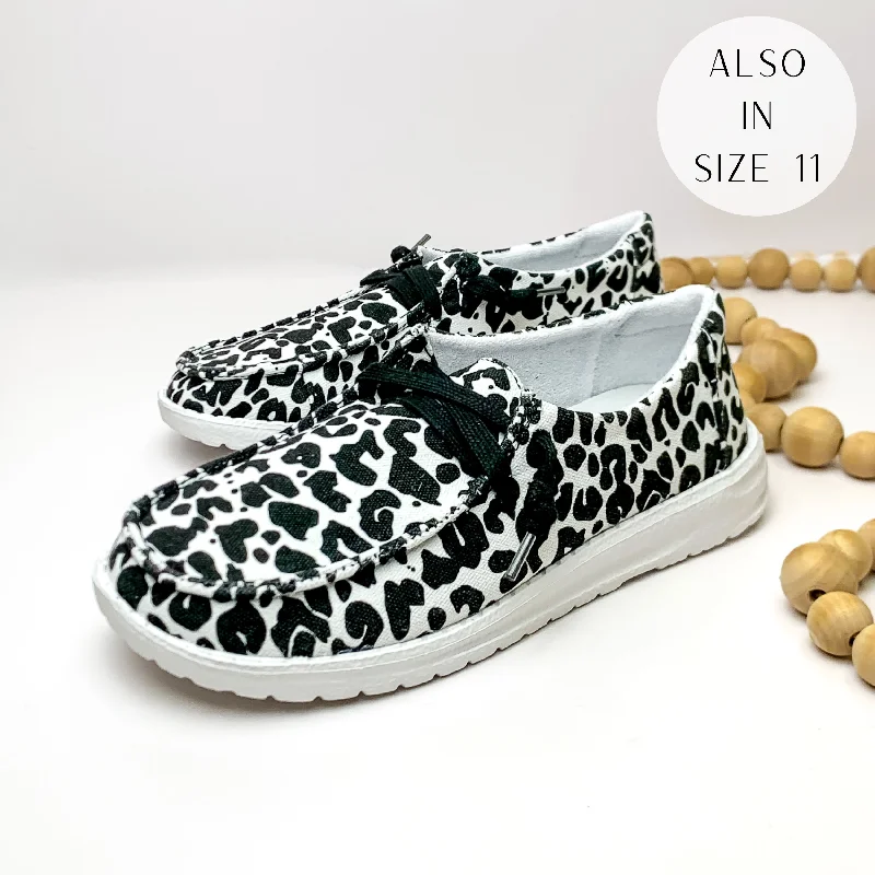 Very G | Have To Run Cow Print Slip On Loafers with Laces in Black Retro Plimsoll Style Very G | Have To Run Cow Print Slip On Loafers with Laces in Black Retro Plimsoll Style